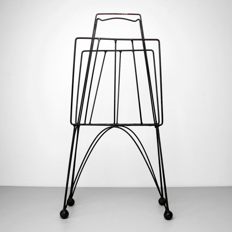 Metal newspaper holder, 1960s/70s.